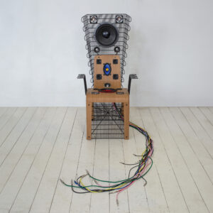 A bamboo chair adorned with black fridge coils, incorporating speakers and an intricate network of cables connected to them, meticulously designed for a mute sound experience.